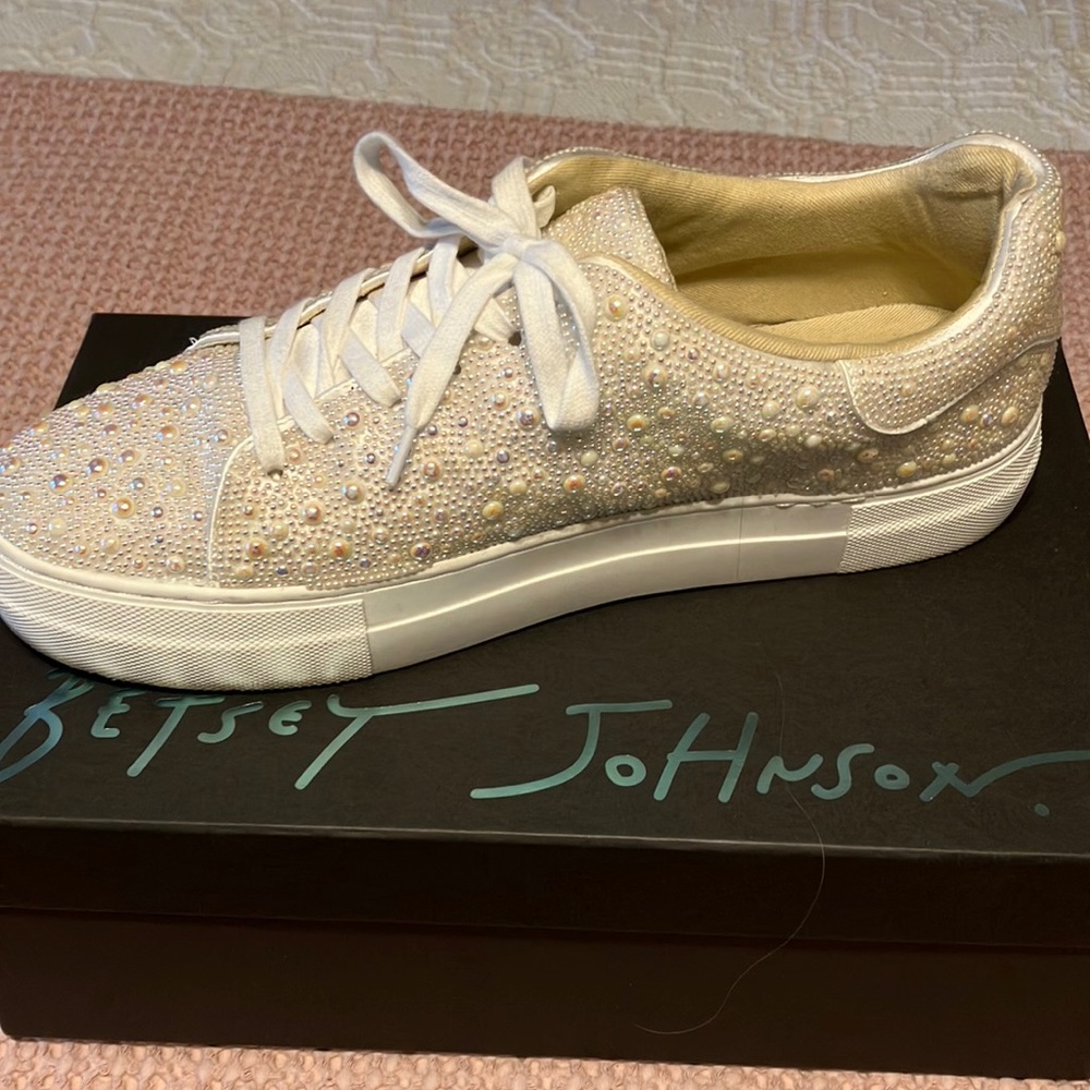 Pearl studded Betsey Johnson tennis shoes.